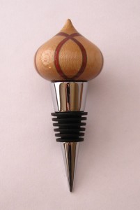 Bottle Stopper. Red and Green laminated with sycamore. Minaret shape. Chrome and rubber stopper.